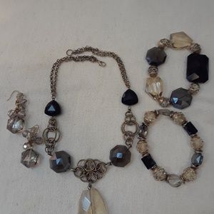 4 piece glass set  with a finish of Russian gold.